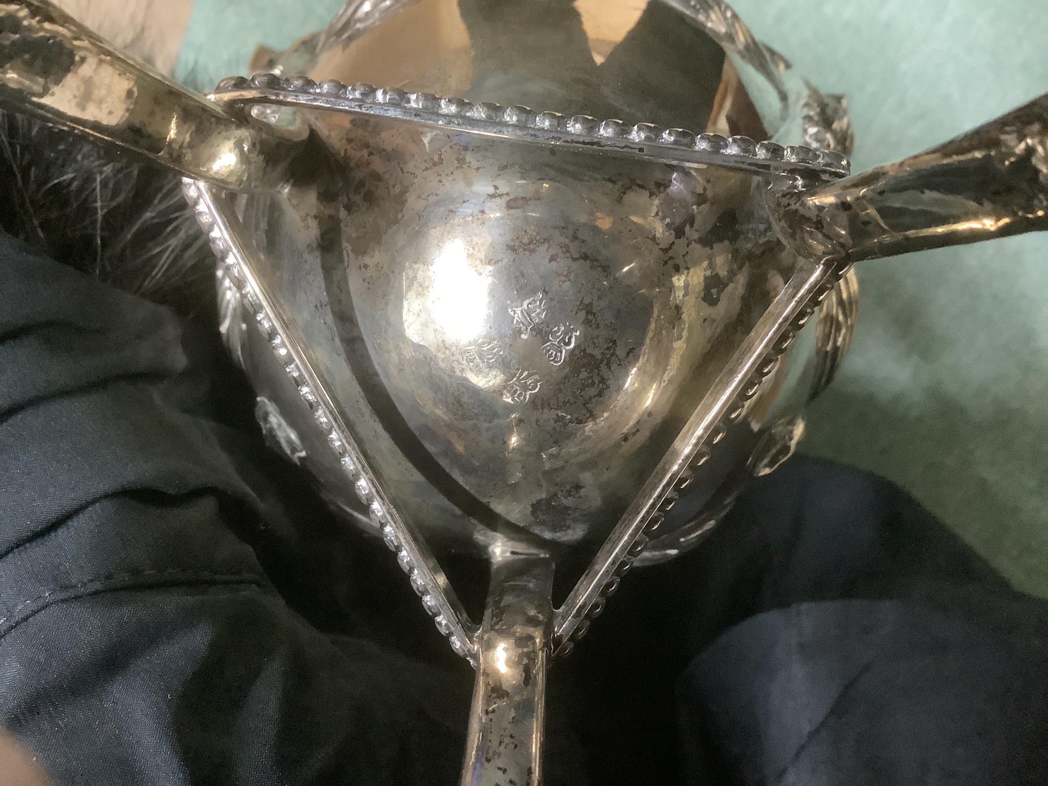 An 18th century French silver vase shaped claret jug